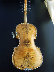 Decorated Hardanger fiddle, tree of life design.