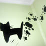 Who walked on my walls with muddy paws?