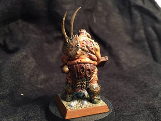 Behind The Nurgle Chaos Lord.