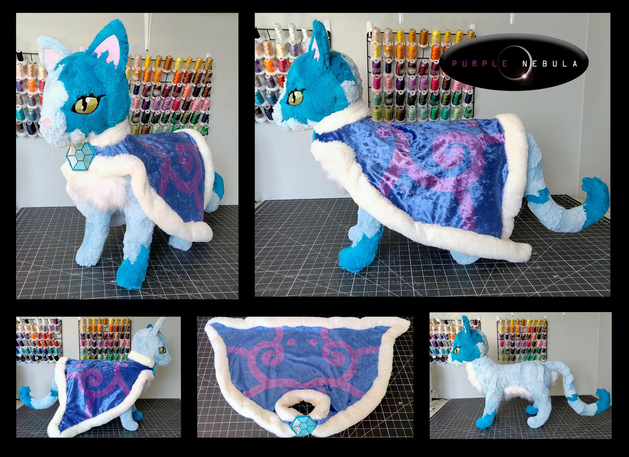 20in long plush Kitty with removeable cape!
