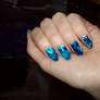Blue water marbled nails