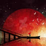 A boat adrift beneath a burning sky