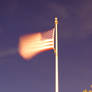 American flag on a windy night