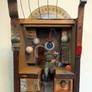 Assemblage: Eyeball Soldier in Clock Case