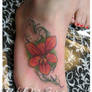 day lily foot tattoo