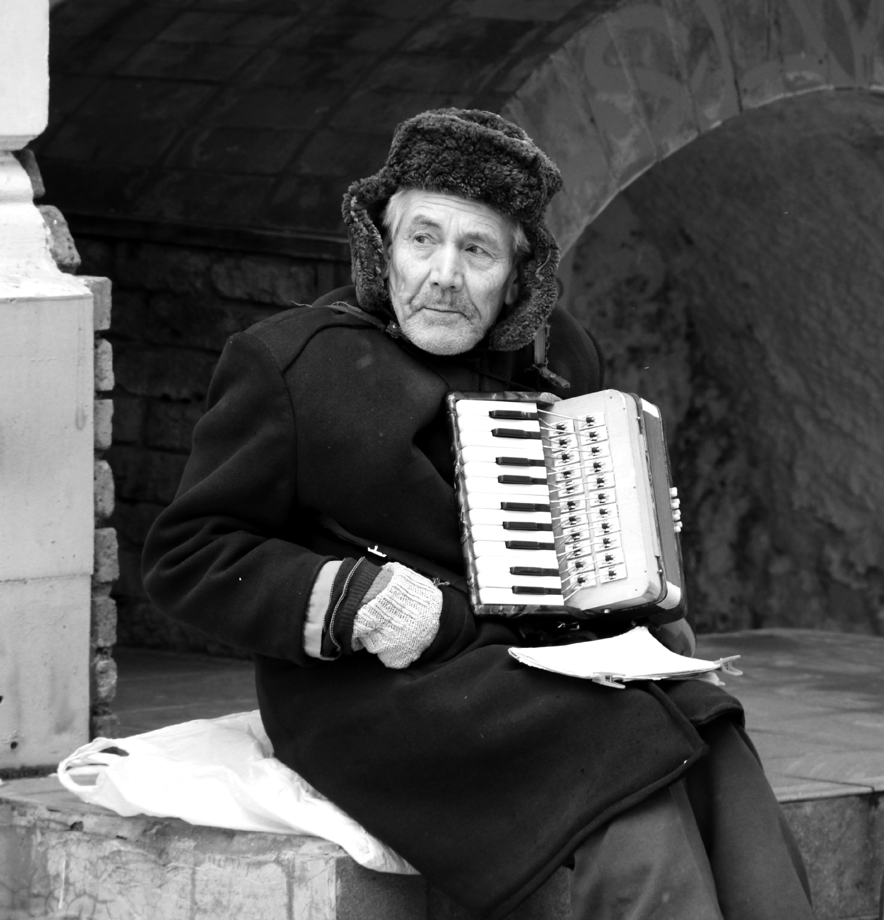 An old accordion player