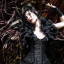 Black shrug bolero and black lace gloves