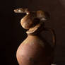 Jug with a snake