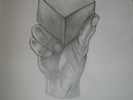 Hand Holding Cube