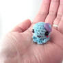 Mini Amigurumi Octie with Purple Heart Button