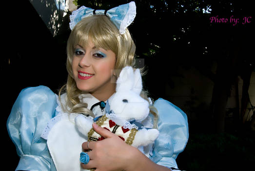 Alice holding white rabbit