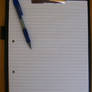 Blue Pen and Lined Paper