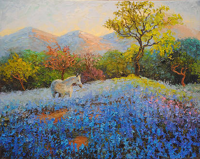 White horse and bluebonnets.