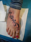 Swirls Foot tattoo done