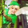 tinkerbell  behind a tree