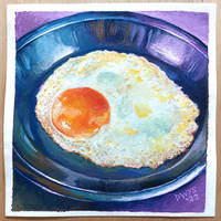 Fried egg on metal plate