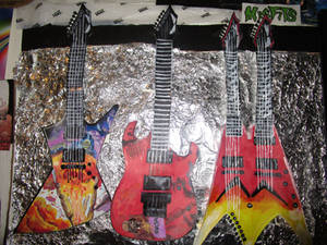 Megadeth Guitars with tin foil background