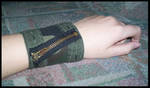 camo cuff with zip detail by something-i-am-not
