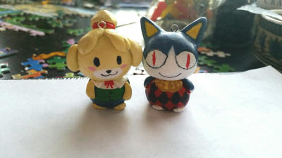 Rover and Isabelle phone charms