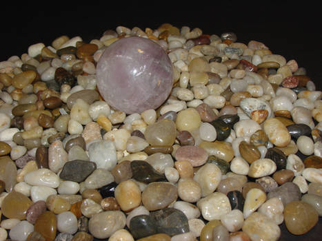 Rose quartz on stones
