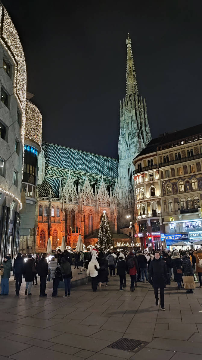 Vienna cityscape in January with snow and holiday lights