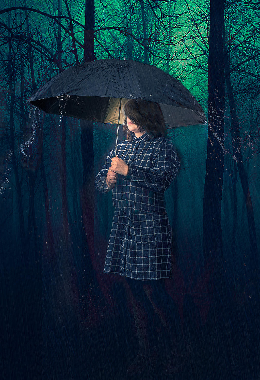 Girl in the rainy forest