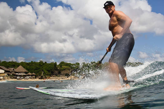 Moody paddle surfer