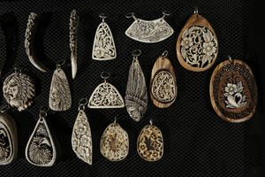 vegetable ivory with olive wood pendants 1