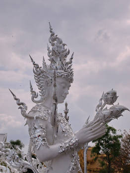 The gardian at Wat Rong Khun