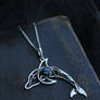 Dolphin topaz necklace