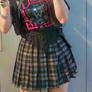 cute girly in black plaid skirt and black t