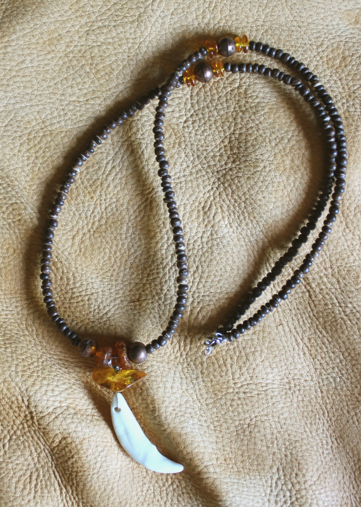 Coyote and amber necklace