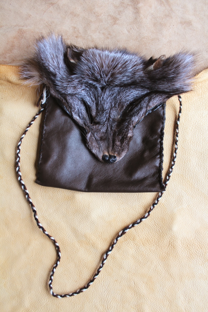 Crystal fox and leather pouch