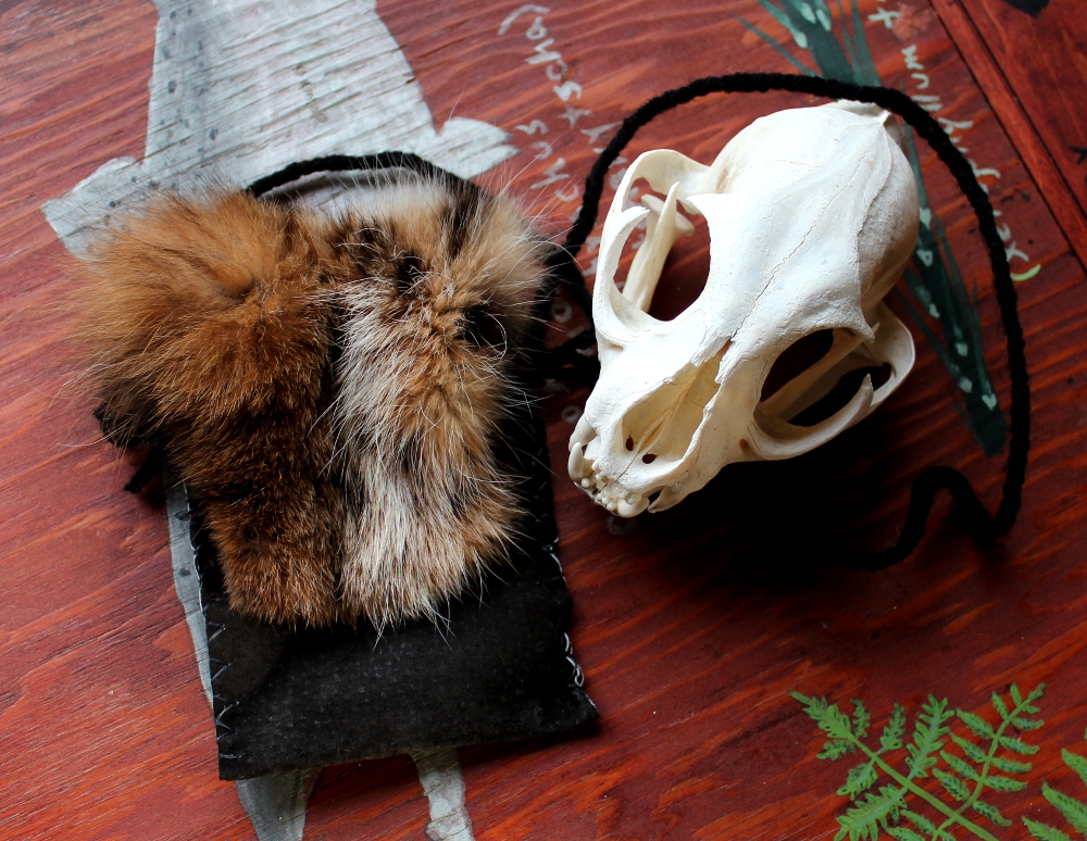 Bobcat and Leather Pouch