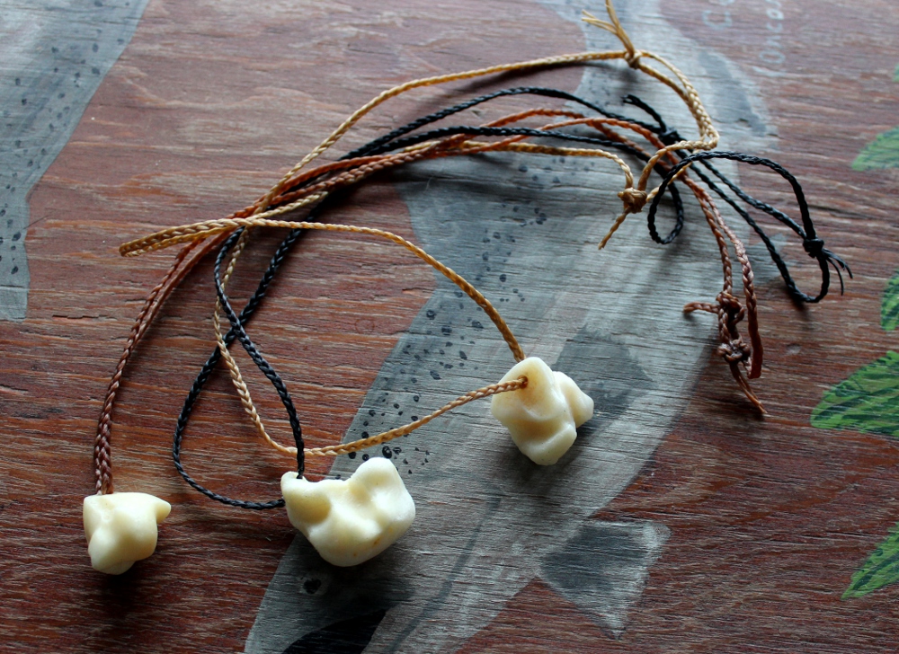 Black Bear Bone Necklaces by lupagreenwolf