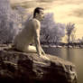 nude with blurred head on rock (infrared)