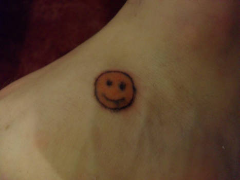 smiley tattoo