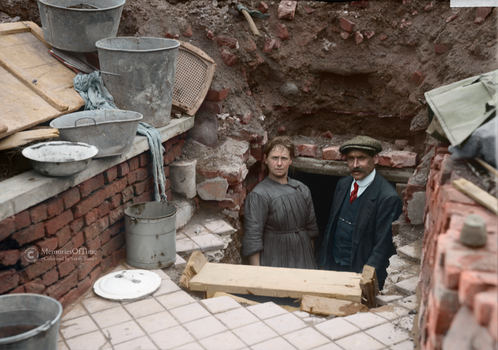 Living in cellar of their former home