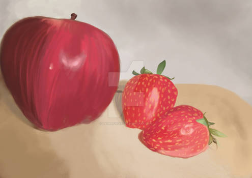 An apple and two strawberries