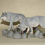 Wolves drinking water figurine