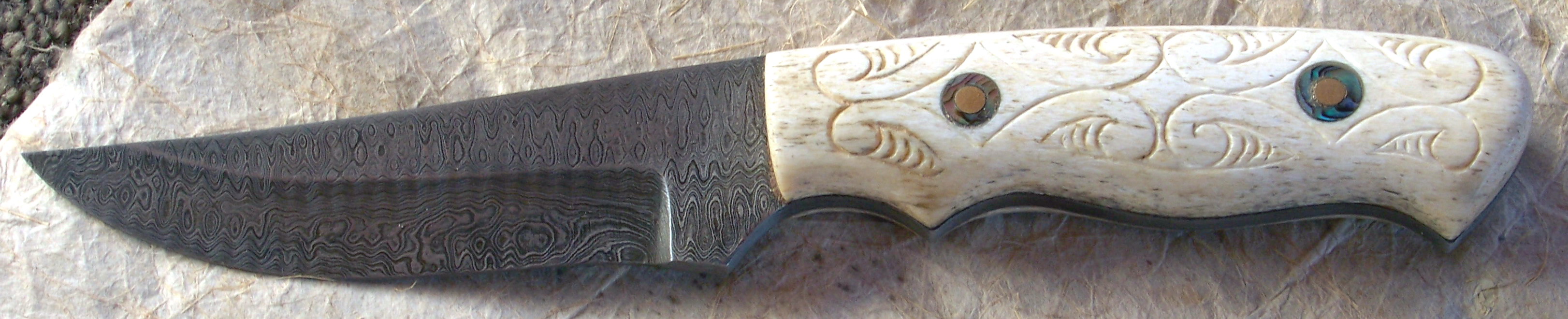 Whalebone handle - damascus steel blade