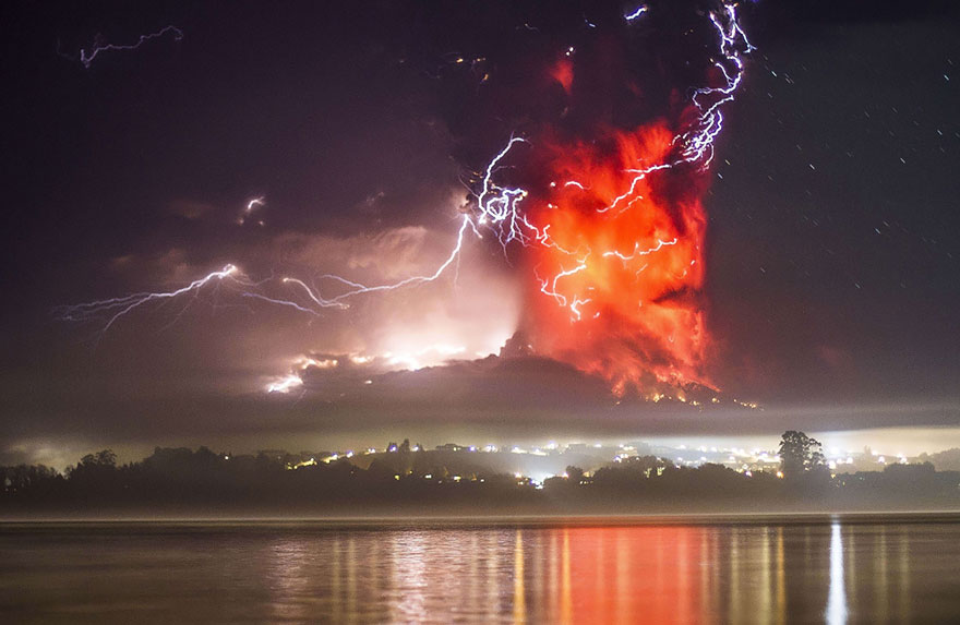 Lightning while a Volcano Erupts