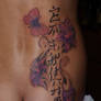 flowers back tattoo