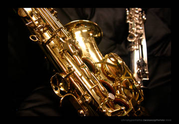 two saxophones