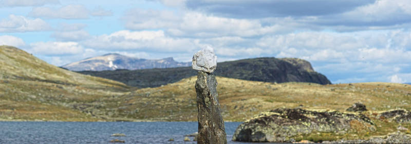 Stone tower on lakeside