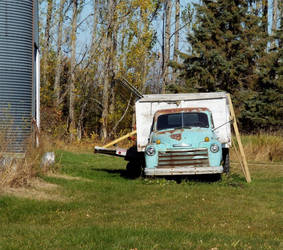 Unused truck sitting at a farm