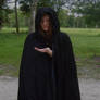 Girl in black cloak -hand out