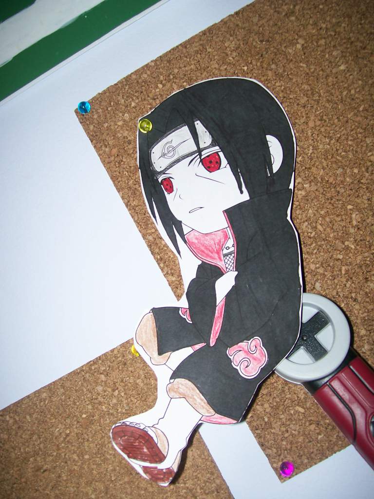 Itachi sitting on Samehada