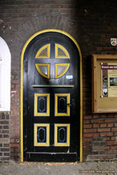 Entrance door with round arch