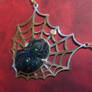 Carved spider opal pendent